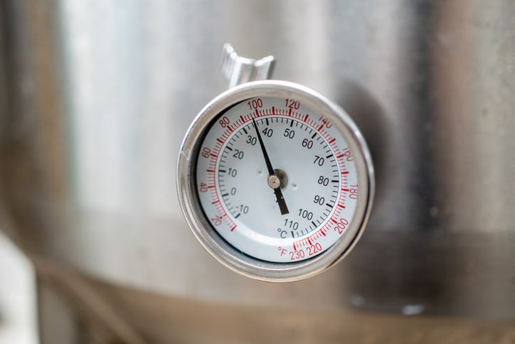 thermometer up close on stainless steel tank