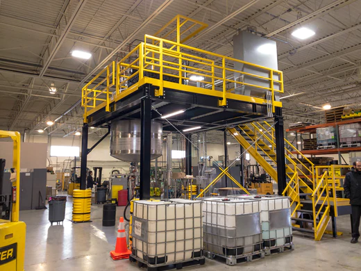 Full tank mezzanine with catwalks
